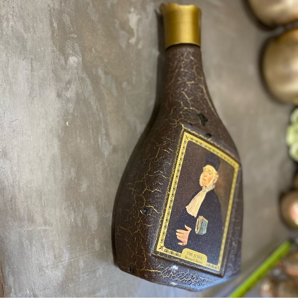 Modern Masters collectible liquor bottle. Some damage to label shown in photos